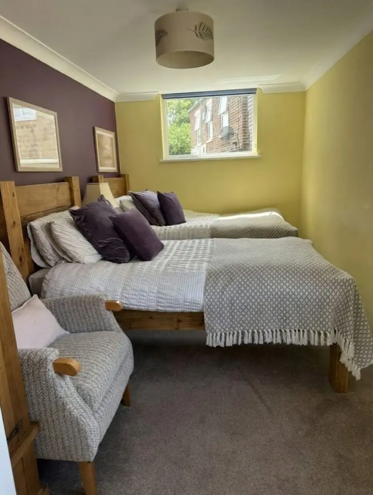 The Stables suite twin bedroom interior